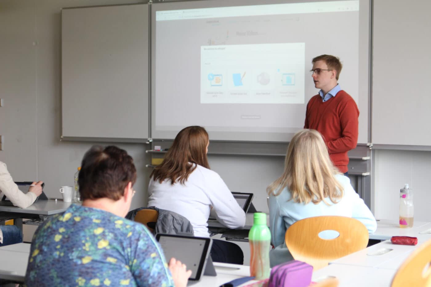 Training session with several participants at laptops